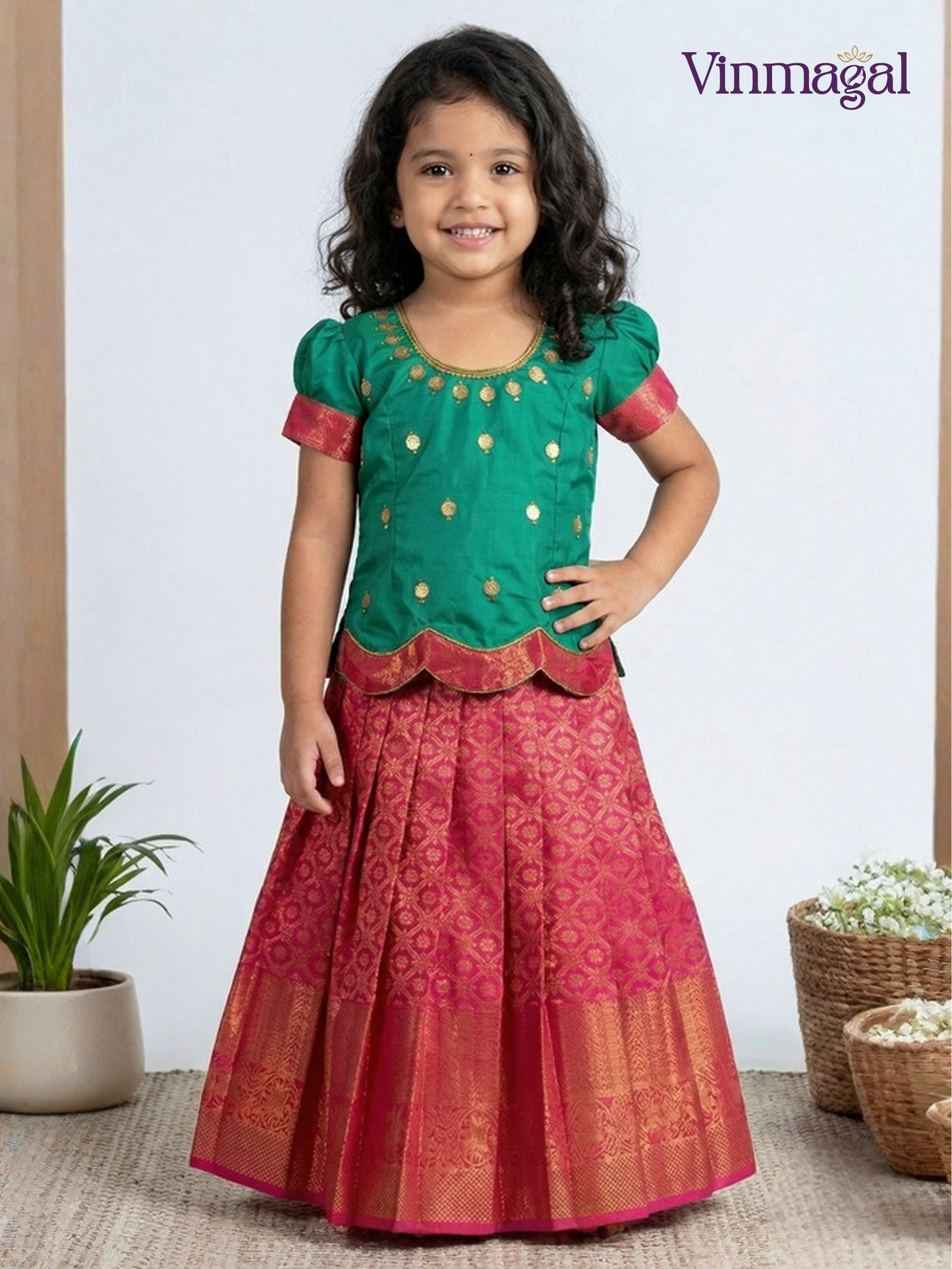 Pink and green semi silk pattu pavadai for girls – traditional South Indian ethnic dress for kids with classic border detail
