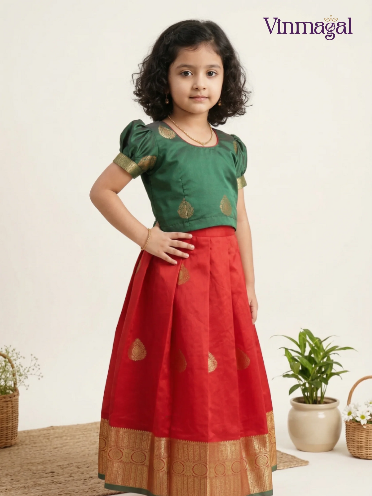 Red and green soft pattu pavadai for girls – traditional South Indian ethnic festive wear for kids with classic border finish
