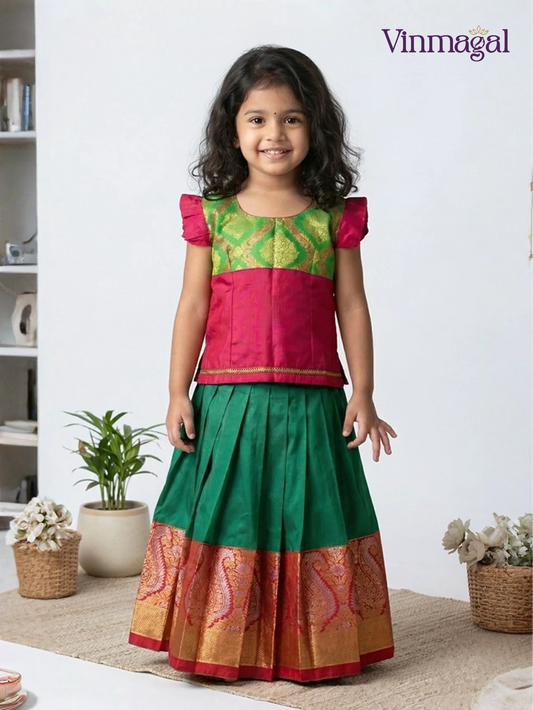 Red and green soft silk pattu pavadai for girls – classic South Indian traditional festive dress for kids with border detailing