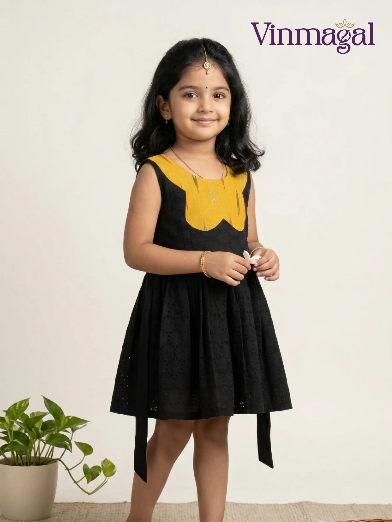 black hakoba cotton frock for girls suitable for casual and party wear