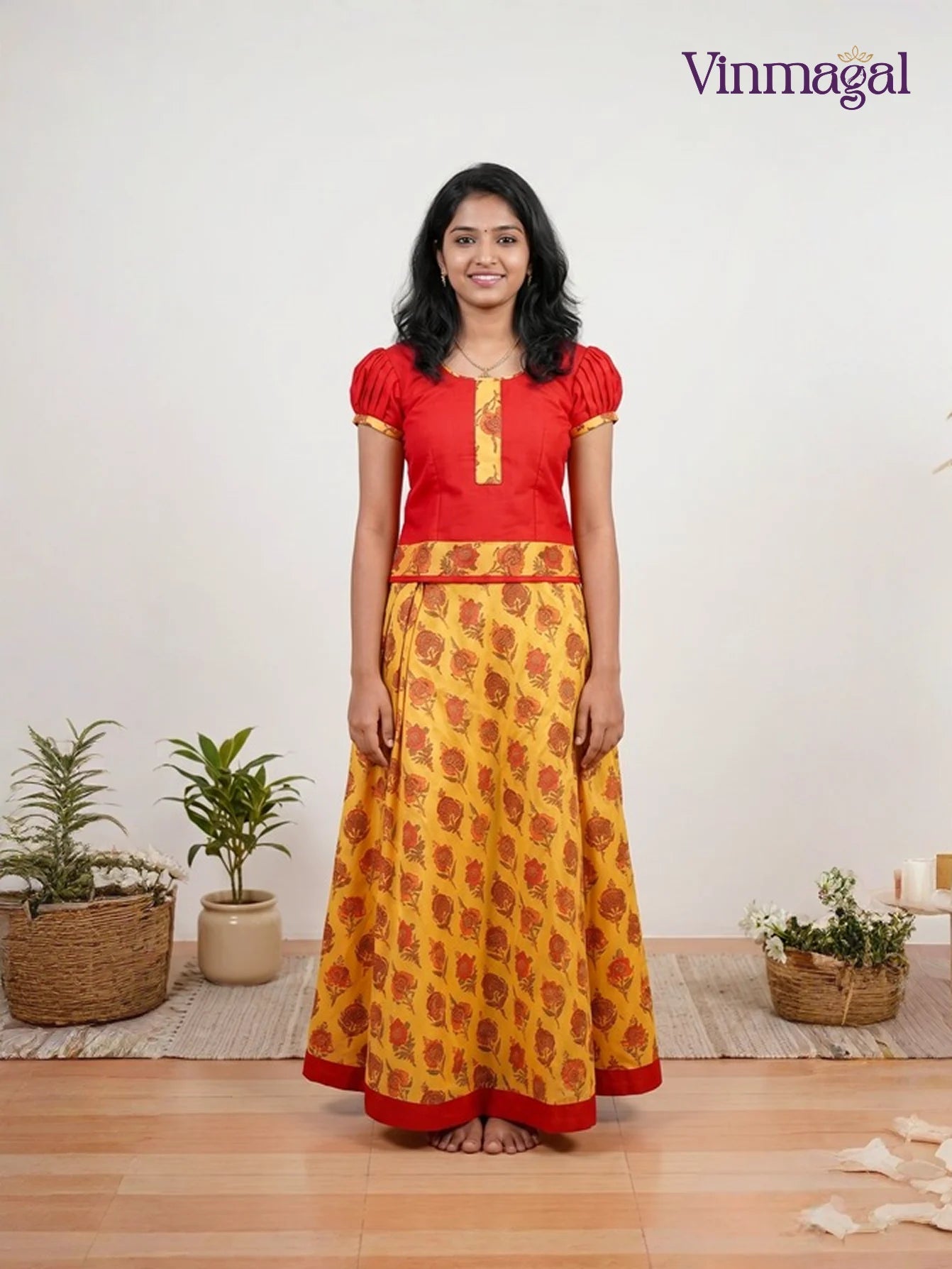 dark orange top with patterned yellow cotton pavadai for girls