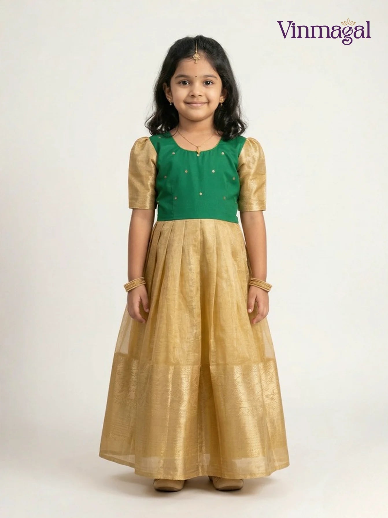 golden tissue silk long gown for girls suitable for festive and party wear