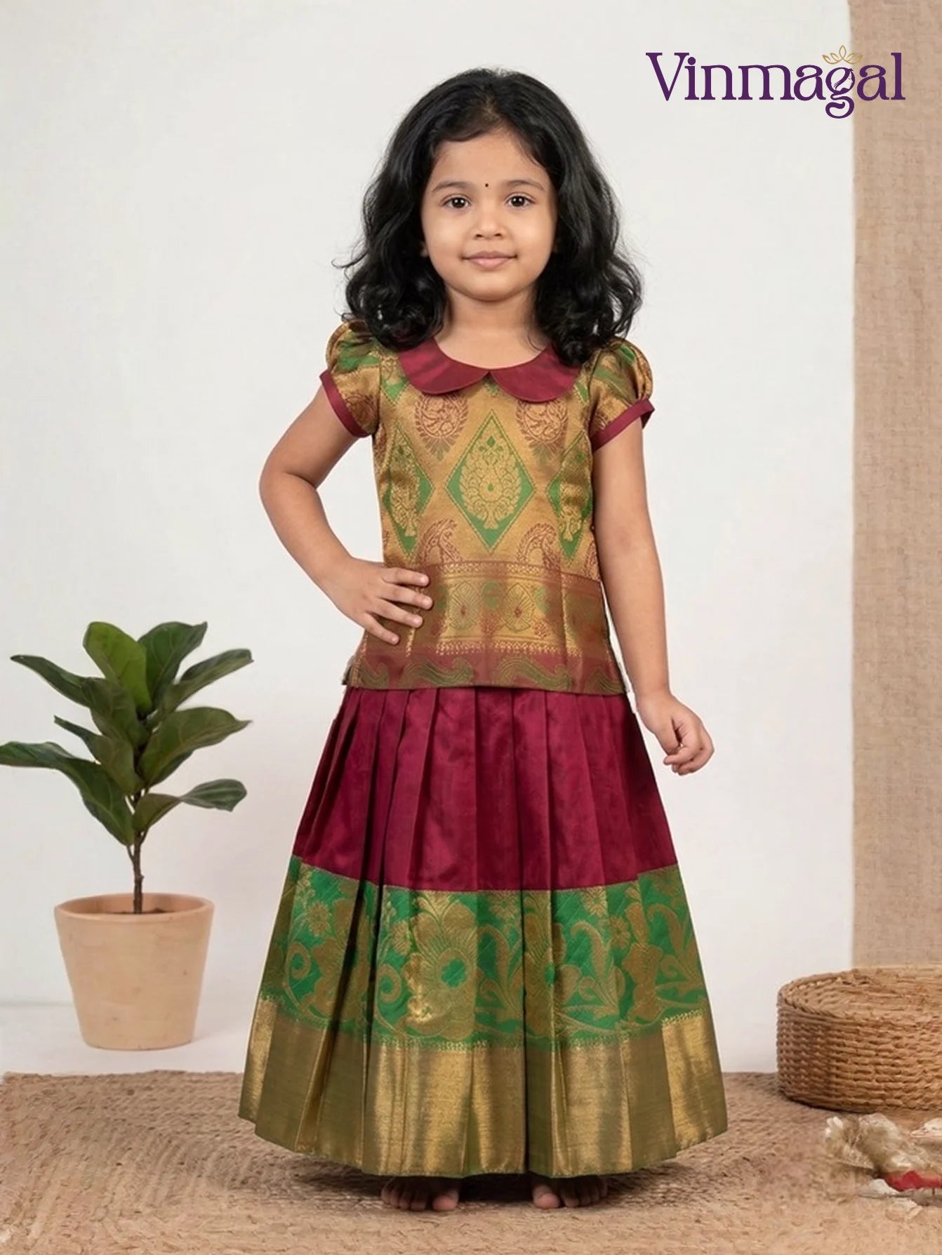 green and red traditional silk pavadai set for kids with zari work blouse and flared skirt