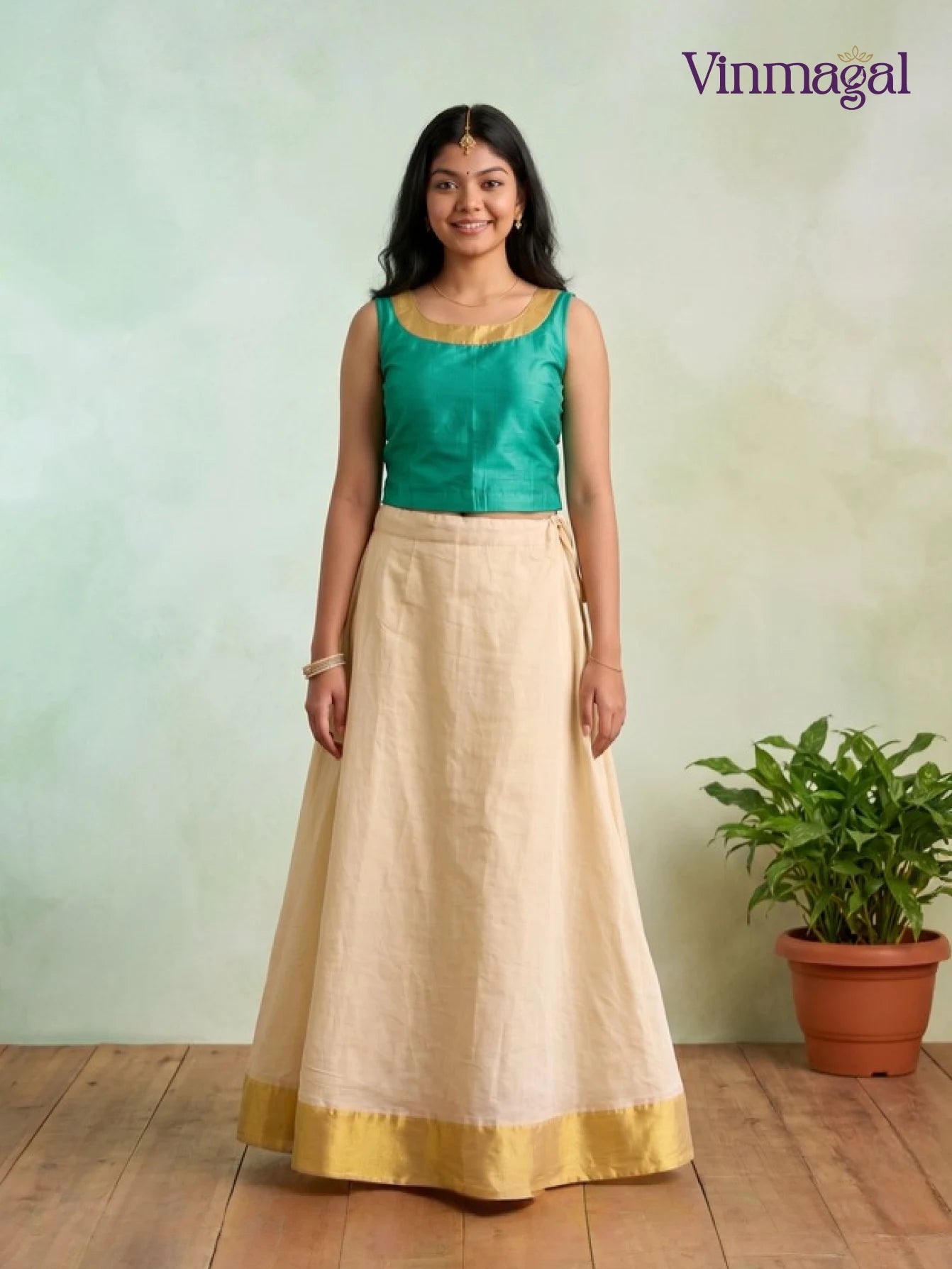 green top with cream white kerala pattu pavadai for girls