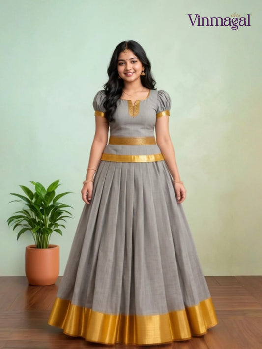 grey and golden coating kerala pattu pavadai for girls in traditional festive style