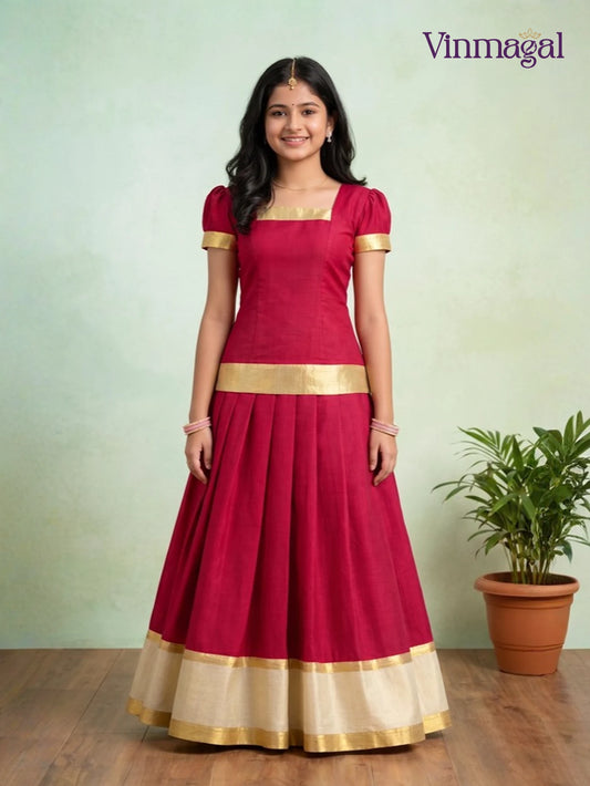 brick red kerala pattu pavadai with cream white and gold border for girls