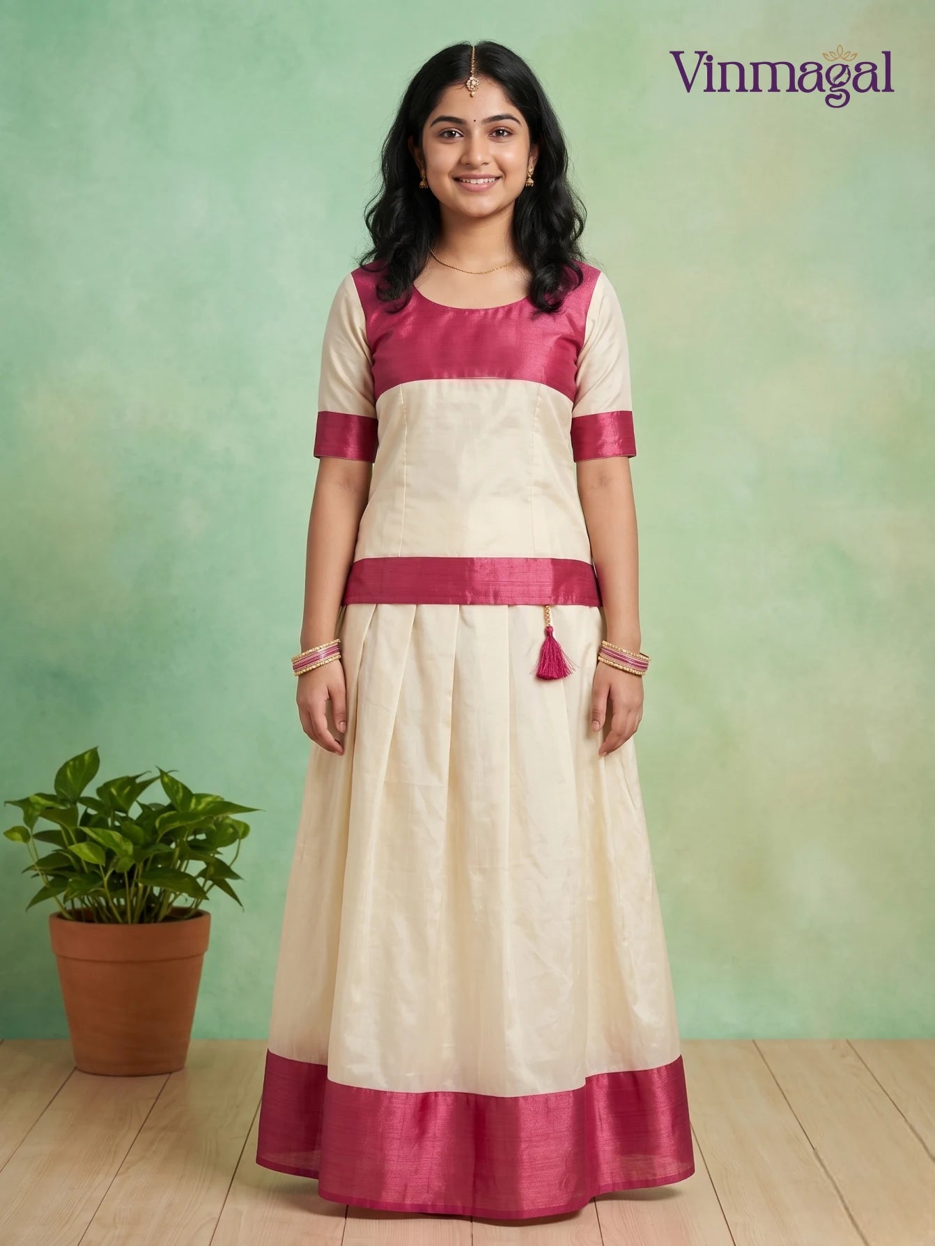 dark pink and cream white kerala pattu pavadai for girls festive wear