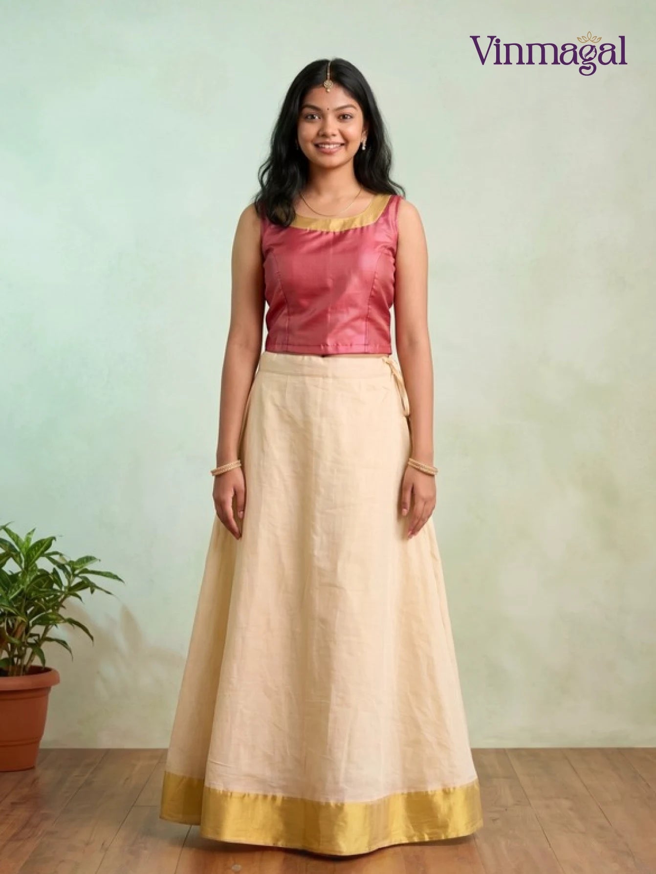 dark pink and cream white kerala pattu pavadai for girls festive wear