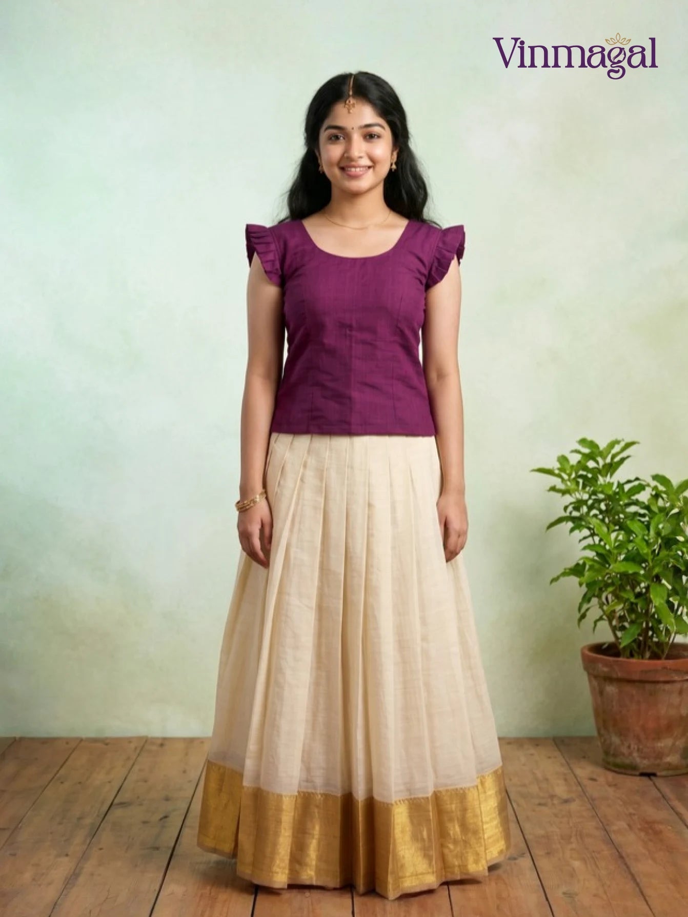 dark red top with cream white kerala pattu pavadai for girls festive wear