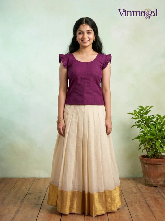 dark red top with cream white kerala pattu pavadai for girls festive wear