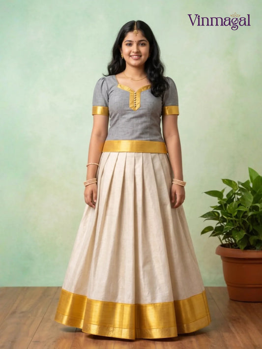 grey top with cream white kerala pattu pavadai featuring golden border for girls