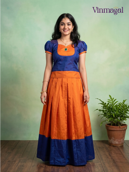 indigo top with orange kerala pattu pavadai set for girls