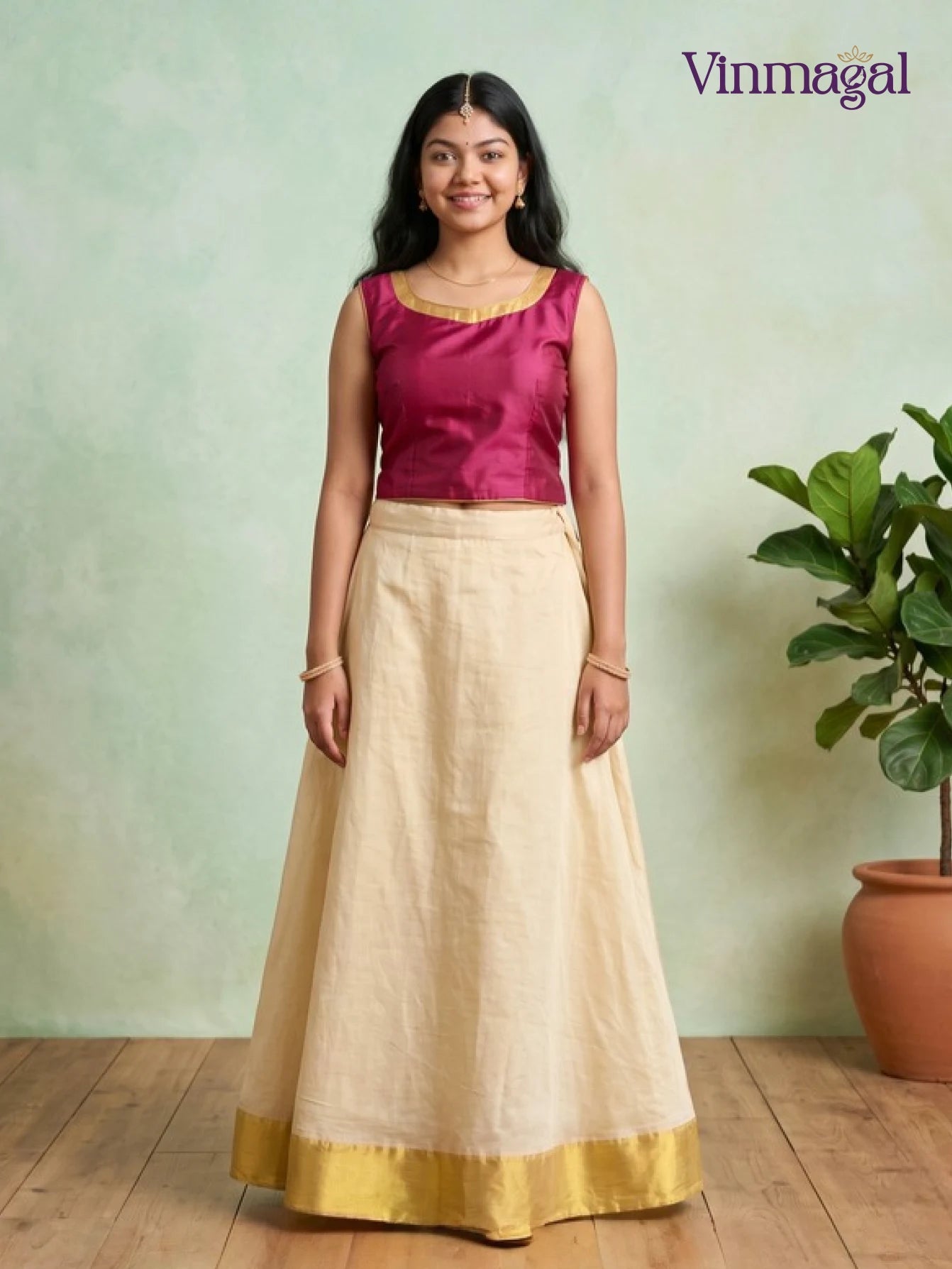 maroon and golden white kerala pattu pavadai for girls festive wear