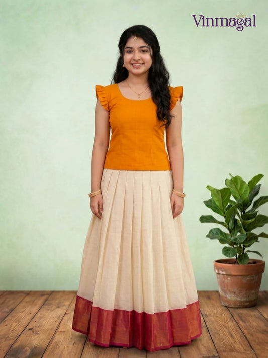 orange top with cream white kerala pattu pavadai featuring maroon border for girls