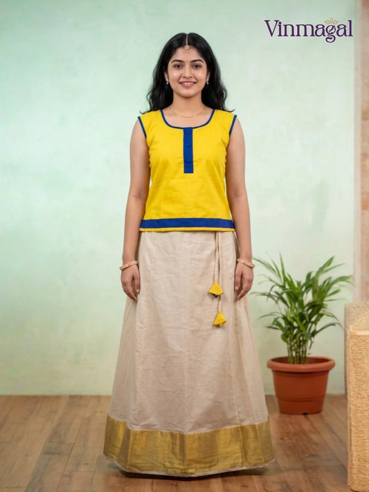 yellow top with golden white kerala pattu pavadai for girls festive wear