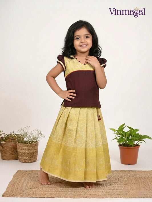 Kids pure silk pavadai set in brown and sandal with peacock zari skirt elephant border and puff sleeve top