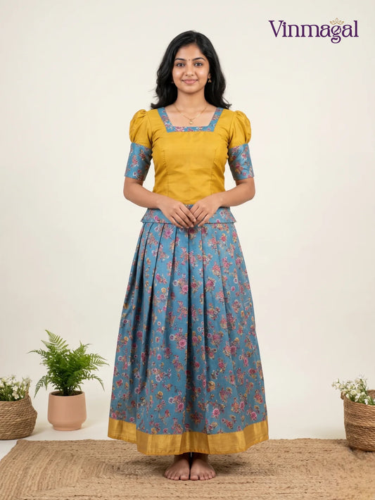 mustard yellow and floral sky blue cotton pavadai sattai for girls in traditional style