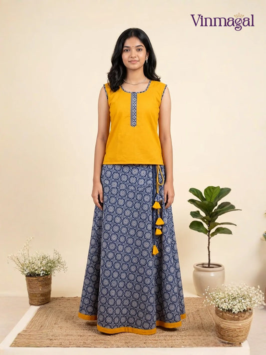 mustard yellow and indigo blue cotton pavadai sattai for girls in traditional ethnic style