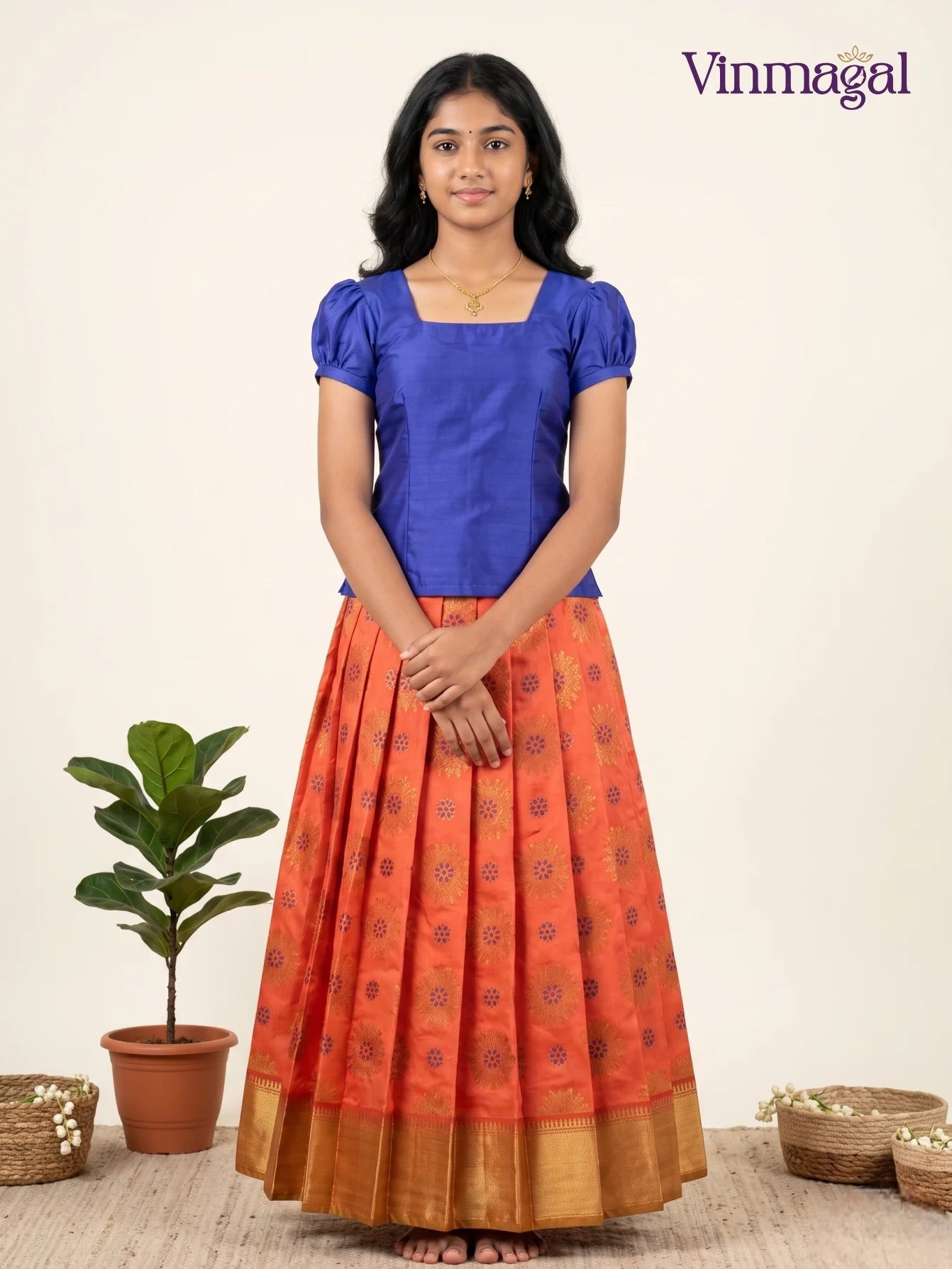 navy blue butter silk blouse with floral banarasi semi silk pattu pavadai set for girls