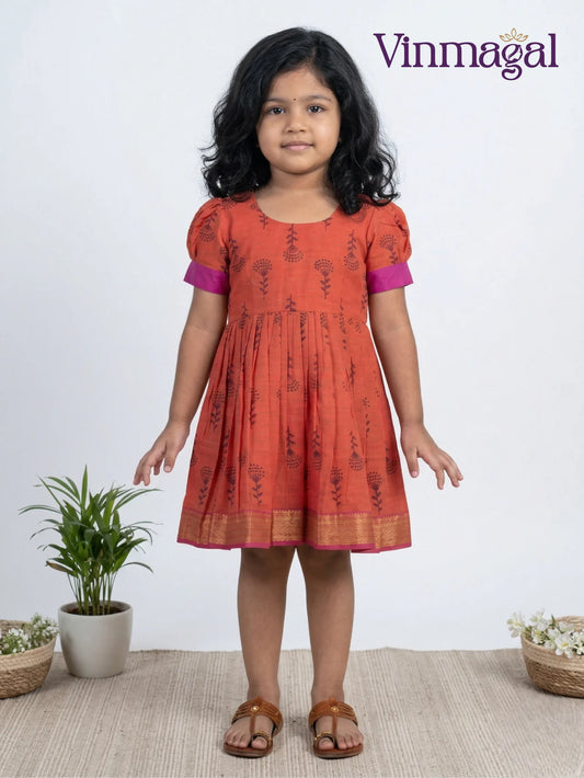 Orange printed cotton frock for girls soft breathable daily festive wear dress