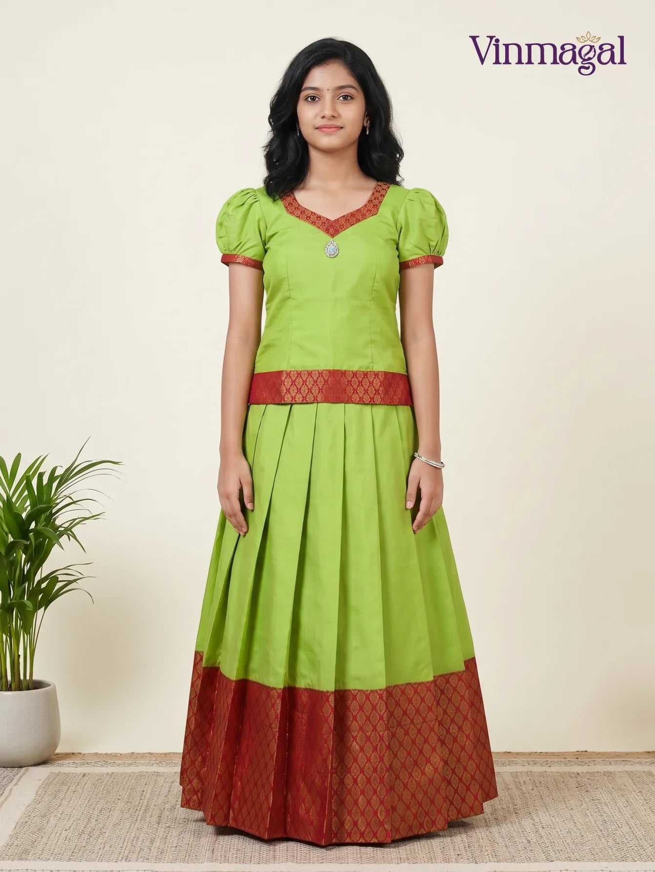 parrot green and maroon semi silk pattu pavadai for girls traditional wear