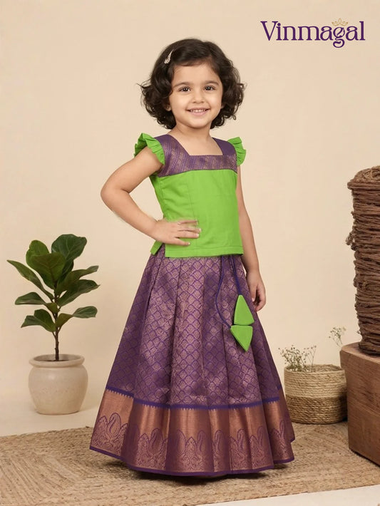 parrot green and violet silk pavadai skirt set for girls in traditional pattu style