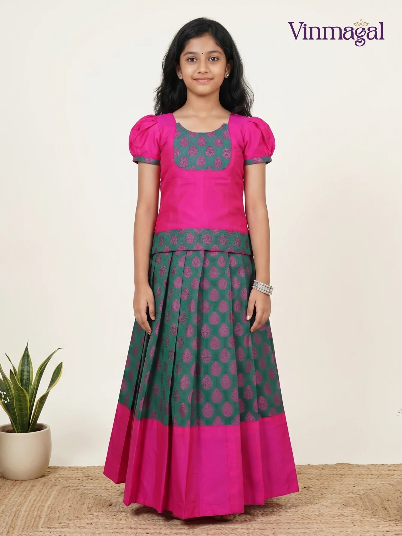 peacock green pink semi silk pattu pavadai for girls traditional wear