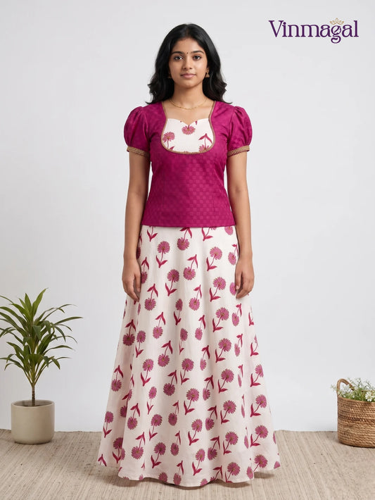 pink top with white floral cotton pattu pavadai for girls traditional wear