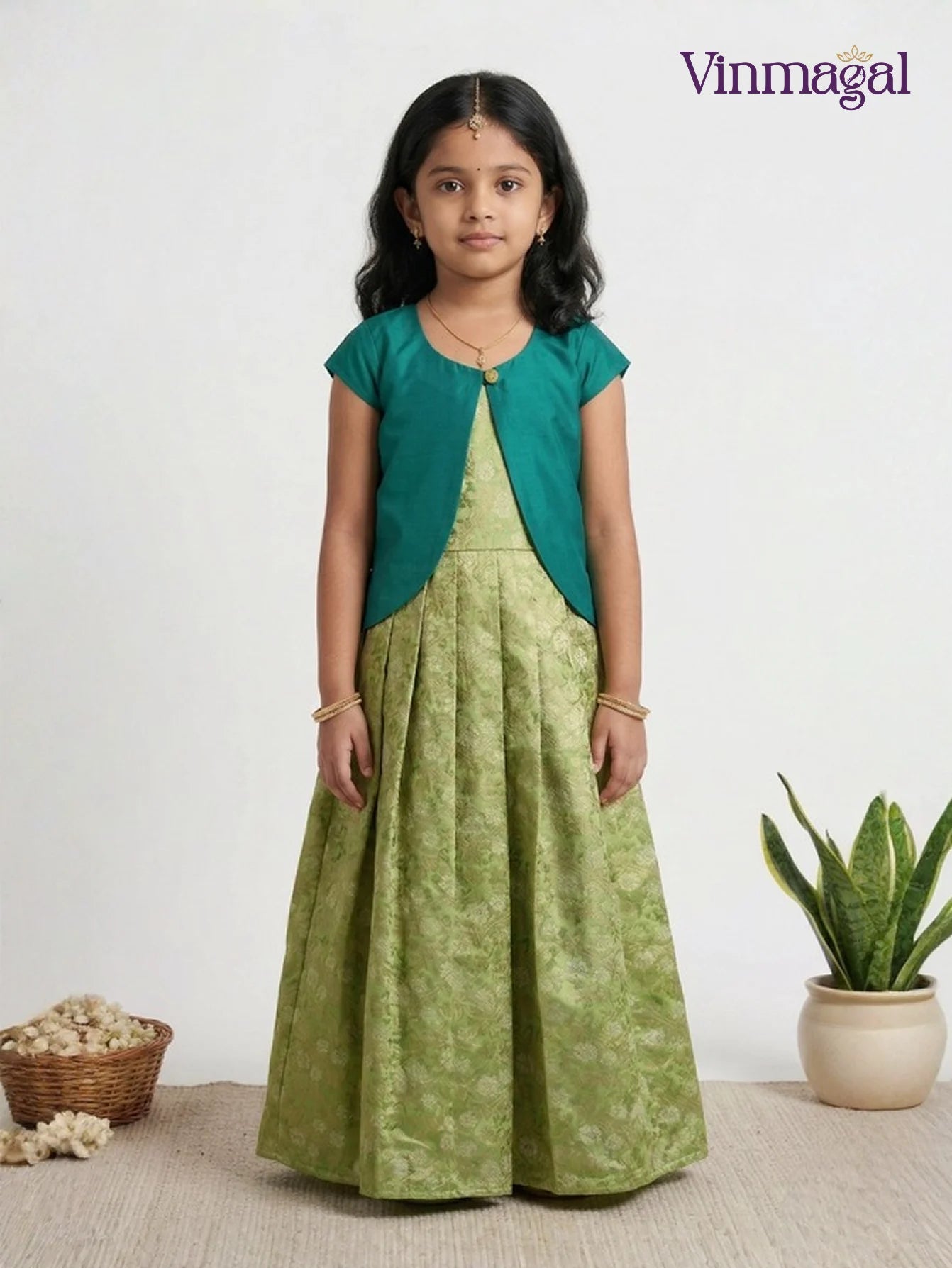 pista green banarasi silk long gown with shrugs for kids suitable for traditional and party occasions