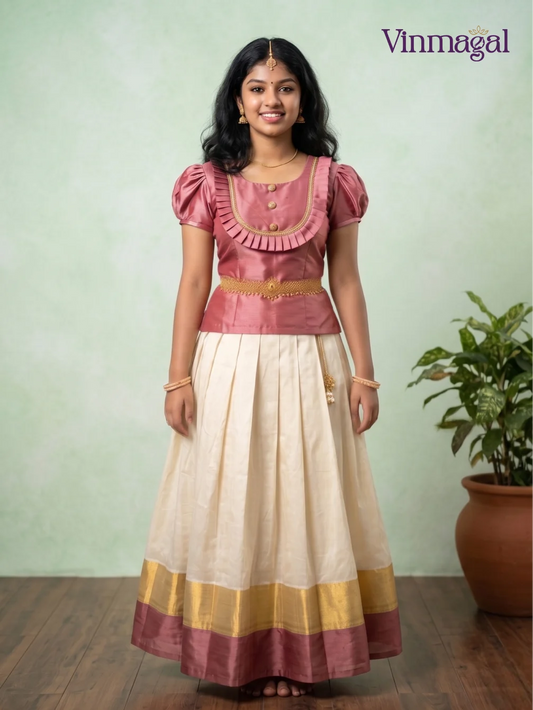 Rose pink top and cream Kerala pattu pavadai with gold border for girls traditional South Indian ethnic outfit for Onam Vishu weddings and festive occasions