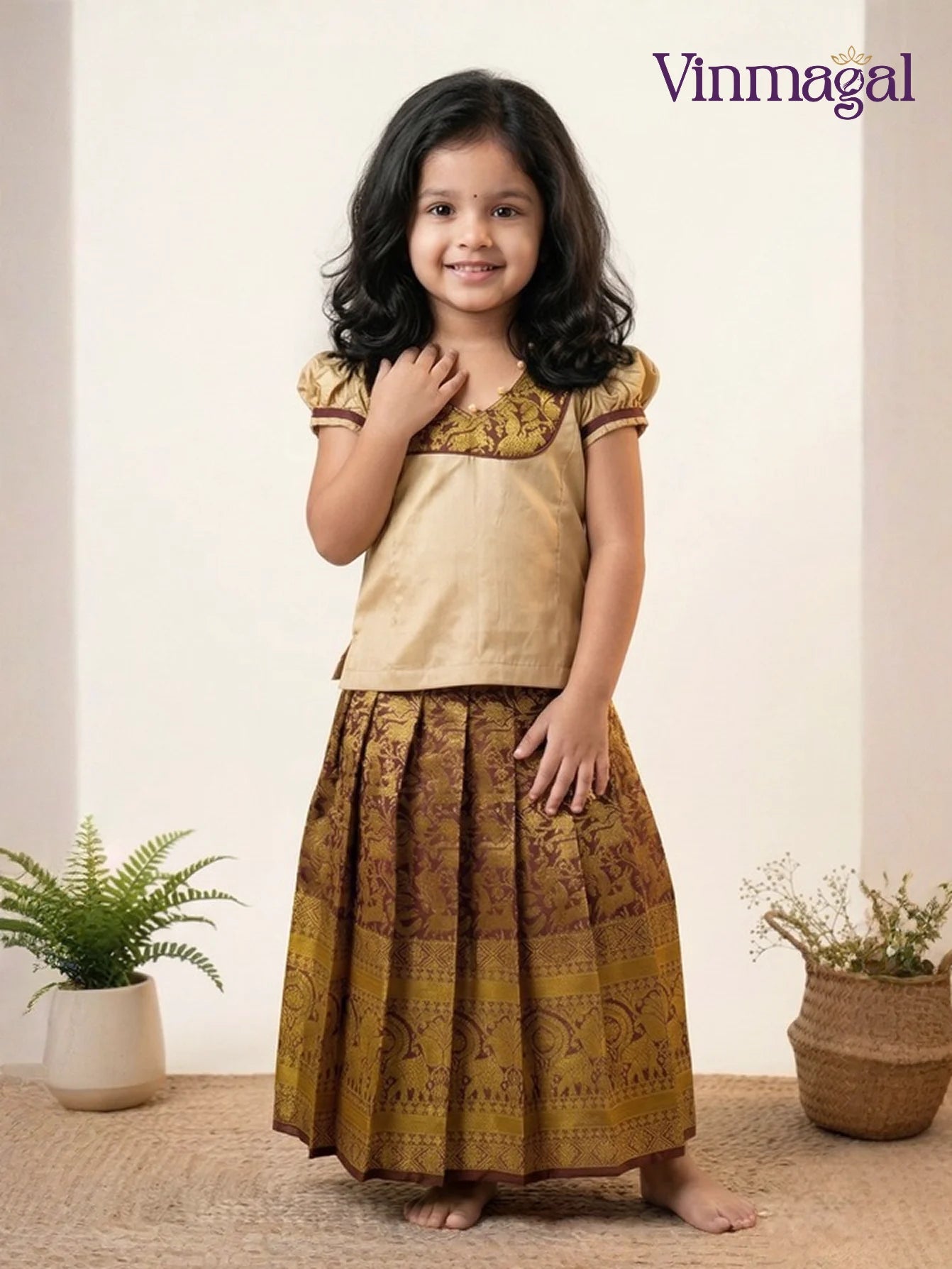 sandal and brown pure silk pavadai for kids with peacock zari and elephant border