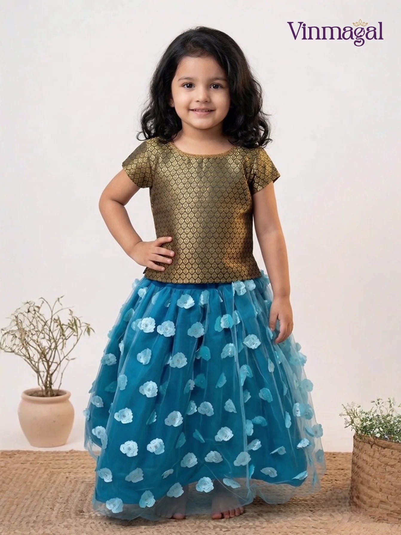 sky blue netted langa with black brocade top for girls in ethnic skirt set