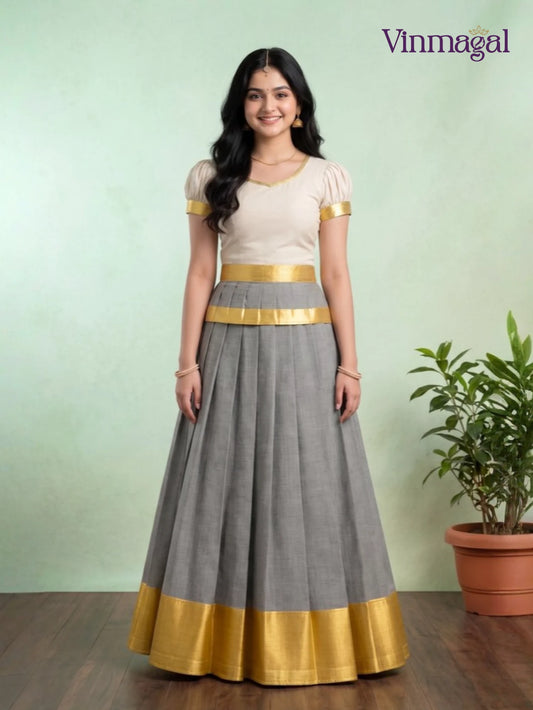 white and grey kerala pattu pavadai for girls suitable for festive wear