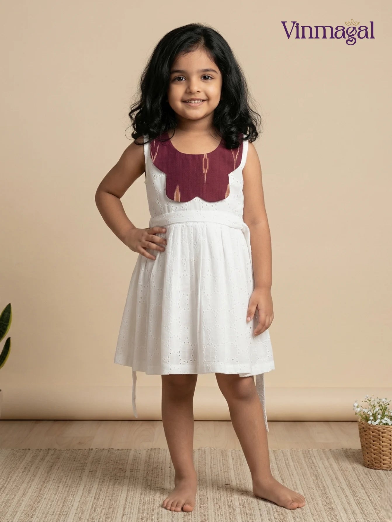 white hakoba cotton frock for girls suitable for party and casual wear
