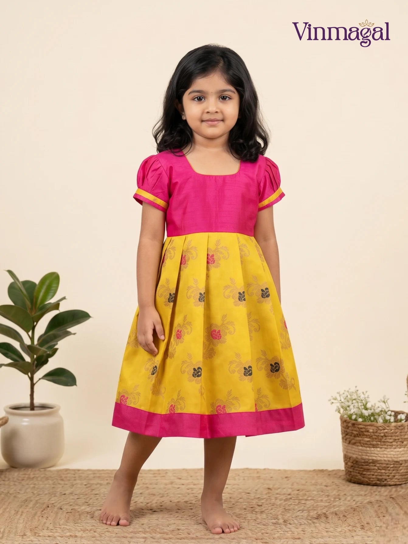 yellow pink banarasi semi silk frock for girls festive wear
