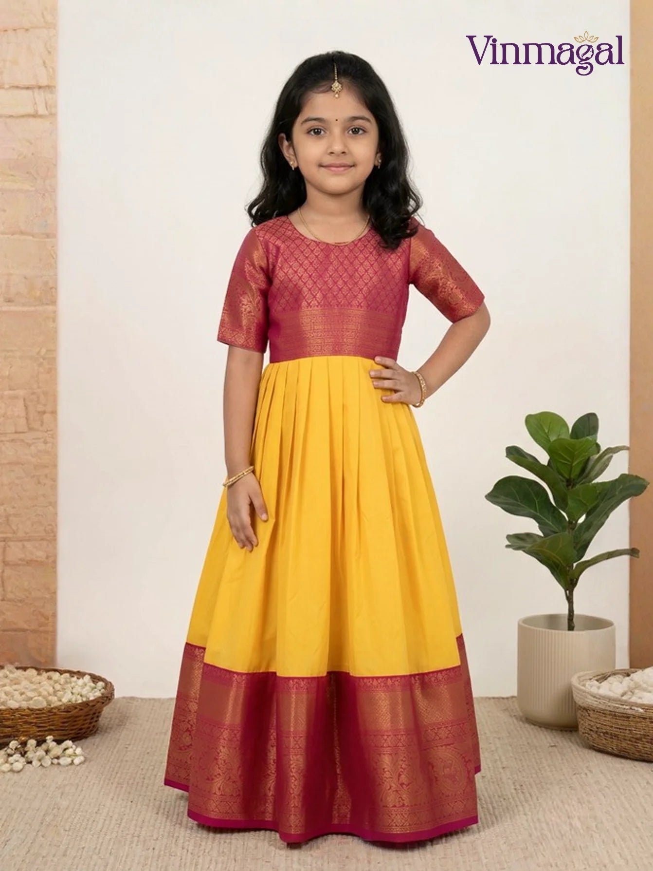 yellow and pink pure silk pattu gown for girls in traditional style