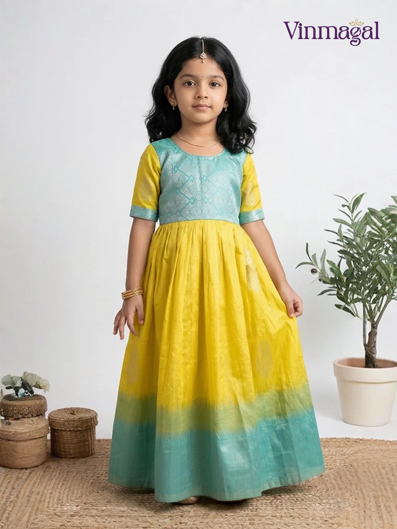 yellow silk cotton long gown for kids with soft breathable fabric